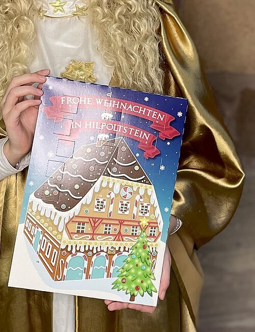 Christkind mit Adventskalender